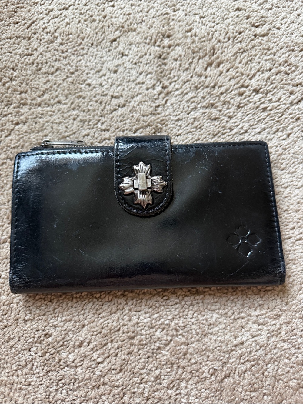 Patrica Nash Black Leather Women's Wallet with Decorative Silver Cross Accent.